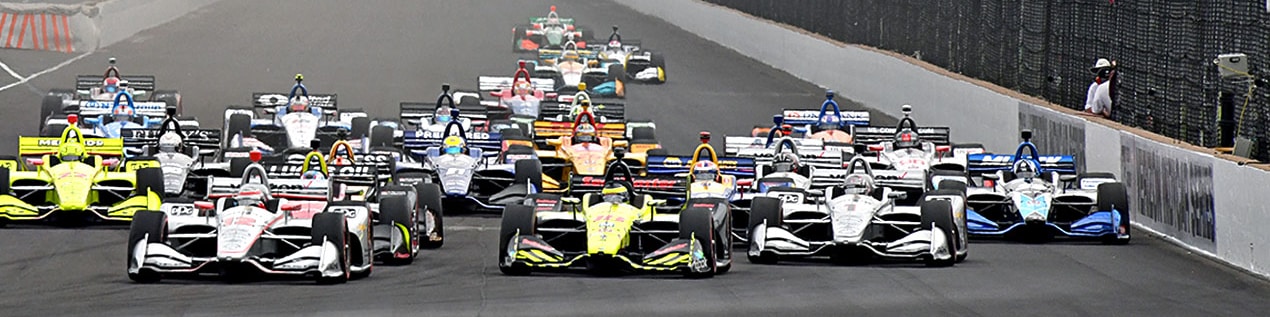 indy cars racing to through the start line Lincoln