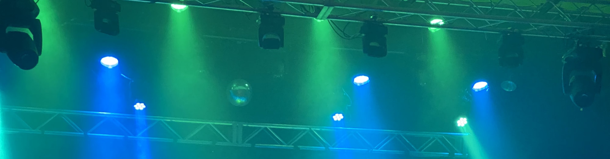 blue and green theater stage lights Lincoln