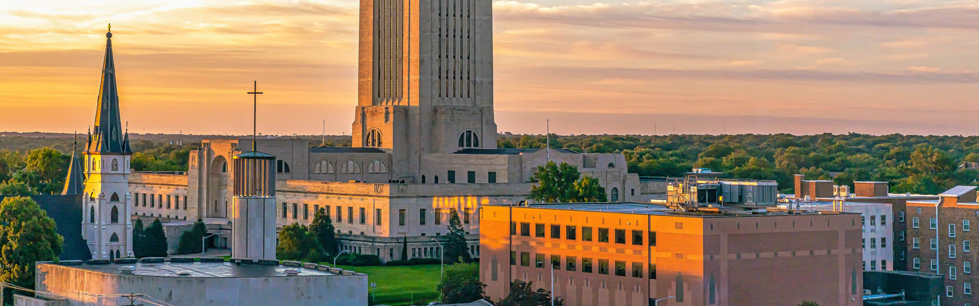 Neon color image of a band playing and people singing along